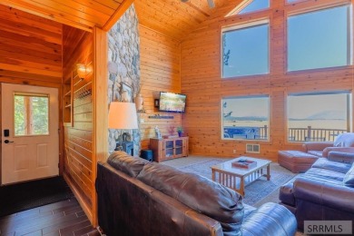 This 3,201 square foot cabin is conveniently located at the IP on Island Park Village Resort Golf Course in Idaho - for sale on GolfHomes.com, golf home, golf lot