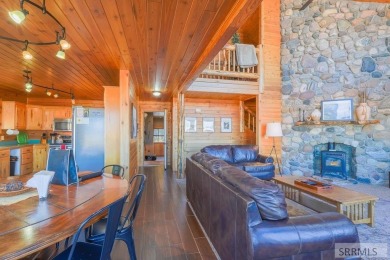 This 3,201 square foot cabin is conveniently located at the IP on Island Park Village Resort Golf Course in Idaho - for sale on GolfHomes.com, golf home, golf lot