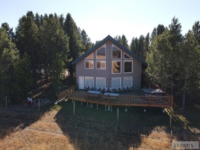 This 3,201 square foot cabin is conveniently located at the IP on Island Park Village Resort Golf Course in Idaho - for sale on GolfHomes.com, golf home, golf lot