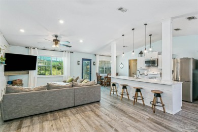 Tucked away in a quiet Gulf Breeze neighborhood, this on Tiger Point Golf and Country Club in Florida - for sale on GolfHomes.com, golf home, golf lot
