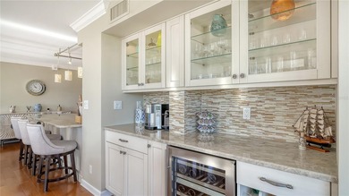 Located behind the gates of the Longboat Key Club, this updated on Links on Longboat Golf Club in Florida - for sale on GolfHomes.com, golf home, golf lot