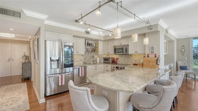 Located behind the gates of the Longboat Key Club, this updated on Links on Longboat Golf Club in Florida - for sale on GolfHomes.com, golf home, golf lot