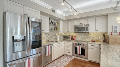 Located behind the gates of the Longboat Key Club, this updated on Links on Longboat Golf Club in Florida - for sale on GolfHomes.com, golf home, golf lot