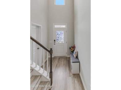Step into a home designed for comfort, convenience, and on Lennon Hills Golf Course in North Carolina - for sale on GolfHomes.com, golf home, golf lot
