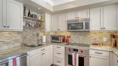 Located behind the gates of the Longboat Key Club, this updated on Links on Longboat Golf Club in Florida - for sale on GolfHomes.com, golf home, golf lot