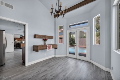 Discover incredible potential in this upgraded single-story home on Painted Desert Golf Club in Nevada - for sale on GolfHomes.com, golf home, golf lot