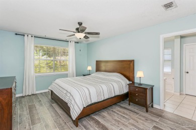 Tucked away in a quiet Gulf Breeze neighborhood, this on Tiger Point Golf and Country Club in Florida - for sale on GolfHomes.com, golf home, golf lot