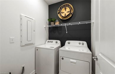 Step into modern comfort with this beautifully designed Cedar on River Hall Country Club in Florida - for sale on GolfHomes.com, golf home, golf lot