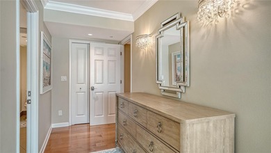 Located behind the gates of the Longboat Key Club, this updated on Links on Longboat Golf Club in Florida - for sale on GolfHomes.com, golf home, golf lot