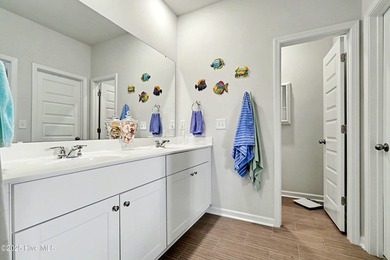 Do you want a 4-bedroom home at a GREAT PRICE, on a tranquil on Ocean Ridge Plantation in North Carolina - for sale on GolfHomes.com, golf home, golf lot