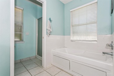 Tucked away in a quiet Gulf Breeze neighborhood, this on Tiger Point Golf and Country Club in Florida - for sale on GolfHomes.com, golf home, golf lot