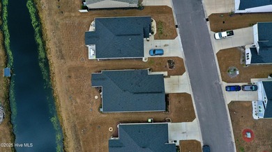 Do you want a 4-bedroom home at a GREAT PRICE, on a tranquil on Ocean Ridge Plantation in North Carolina - for sale on GolfHomes.com, golf home, golf lot