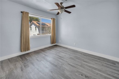Discover incredible potential in this upgraded single-story home on Painted Desert Golf Club in Nevada - for sale on GolfHomes.com, golf home, golf lot