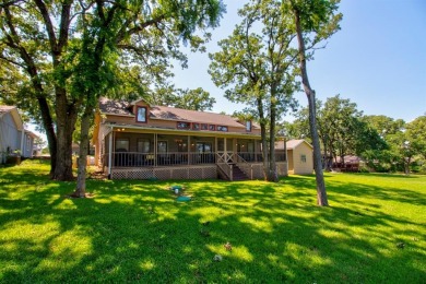 Stunning 5BR, 2.5BA golf course home with lake views on Hole #14 on Lake Kiowa Golf Course in Texas - for sale on GolfHomes.com, golf home, golf lot