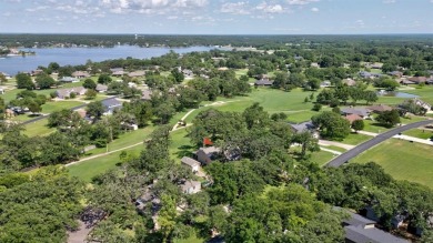 Stunning 5BR, 2.5BA golf course home with lake views on Hole #14 on Lake Kiowa Golf Course in Texas - for sale on GolfHomes.com, golf home, golf lot