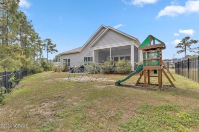 Discover this charming 3-bedroom, 3-bathroom home in the on Olde Point Golf and Country Club in North Carolina - for sale on GolfHomes.com, golf home, golf lot