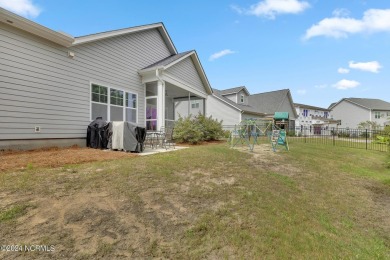 Discover this charming 3-bedroom, 3-bathroom home in the on Olde Point Golf and Country Club in North Carolina - for sale on GolfHomes.com, golf home, golf lot