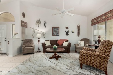 Enjoy the charm of this delightful 2-bedroom end-unit townhome! on Apache Wells Country Club in Arizona - for sale on GolfHomes.com, golf home, golf lot