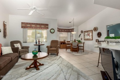 Enjoy the charm of this delightful 2-bedroom end-unit townhome! on Apache Wells Country Club in Arizona - for sale on GolfHomes.com, golf home, golf lot