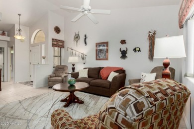 Enjoy the charm of this delightful 2-bedroom end-unit townhome! on Apache Wells Country Club in Arizona - for sale on GolfHomes.com, golf home, golf lot