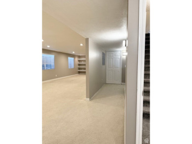 Tucked away on a quiet cul-de-sac and backing directly onto the on Stansbury Park Golf Club in Utah - for sale on GolfHomes.com, golf home, golf lot