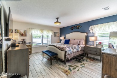 Welcome to your dream home nestled on a quiet cul-de-sac in a on Amelia National Golf and Country Club in Florida - for sale on GolfHomes.com, golf home, golf lot