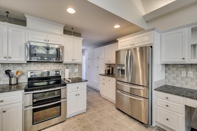 Experience lakefront living at its finest in this beautifully on Tara Golf Club At Savannah Lakes in South Carolina - for sale on GolfHomes.com, golf home, golf lot