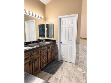 Tucked away on a quiet cul-de-sac and backing directly onto the on Stansbury Park Golf Club in Utah - for sale on GolfHomes.com, golf home, golf lot