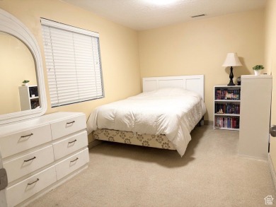 Tucked away on a quiet cul-de-sac and backing directly onto the on Stansbury Park Golf Club in Utah - for sale on GolfHomes.com, golf home, golf lot