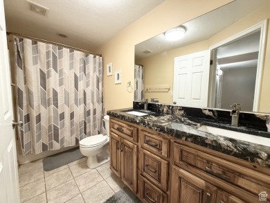 Tucked away on a quiet cul-de-sac and backing directly onto the on Stansbury Park Golf Club in Utah - for sale on GolfHomes.com, golf home, golf lot