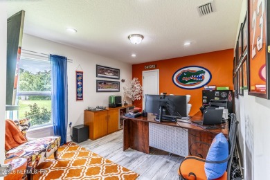 Welcome to your dream home nestled on a quiet cul-de-sac in a on Amelia National Golf and Country Club in Florida - for sale on GolfHomes.com, golf home, golf lot