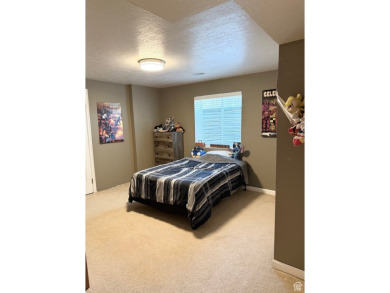 Tucked away on a quiet cul-de-sac and backing directly onto the on Stansbury Park Golf Club in Utah - for sale on GolfHomes.com, golf home, golf lot
