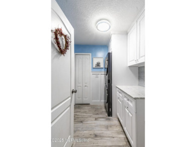 Welcome to your dream home nestled on a quiet cul-de-sac in a on Amelia National Golf and Country Club in Florida - for sale on GolfHomes.com, golf home, golf lot