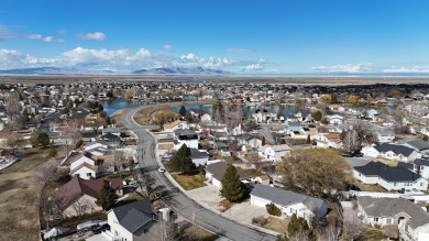 Tucked away on a quiet cul-de-sac and backing directly onto the on Stansbury Park Golf Club in Utah - for sale on GolfHomes.com, golf home, golf lot