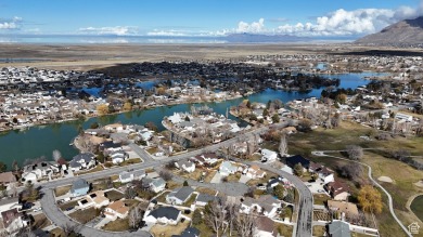 Tucked away on a quiet cul-de-sac and backing directly onto the on Stansbury Park Golf Club in Utah - for sale on GolfHomes.com, golf home, golf lot