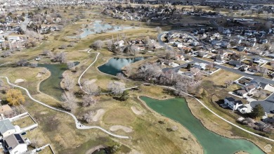 Tucked away on a quiet cul-de-sac and backing directly onto the on Stansbury Park Golf Club in Utah - for sale on GolfHomes.com, golf home, golf lot