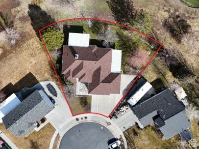 Tucked away on a quiet cul-de-sac and backing directly onto the on Stansbury Park Golf Club in Utah - for sale on GolfHomes.com, golf home, golf lot