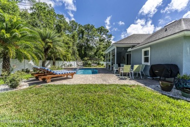 Welcome to your dream home nestled on a quiet cul-de-sac in a on Amelia National Golf and Country Club in Florida - for sale on GolfHomes.com, golf home, golf lot