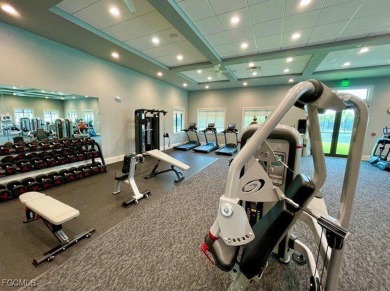 Own this first-floor DiAngelo veranda with deeded golf on Heritage Landing Golf  in Florida - for sale on GolfHomes.com, golf home, golf lot