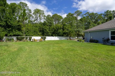 Welcome to your dream home nestled on a quiet cul-de-sac in a on Amelia National Golf and Country Club in Florida - for sale on GolfHomes.com, golf home, golf lot