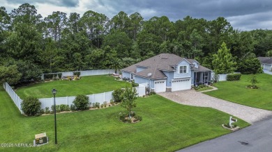 Welcome to your dream home nestled on a quiet cul-de-sac in a on Amelia National Golf and Country Club in Florida - for sale on GolfHomes.com, golf home, golf lot