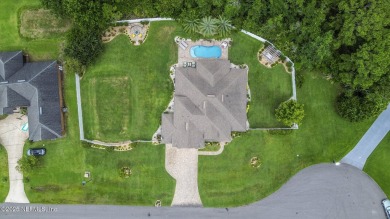 Welcome to your dream home nestled on a quiet cul-de-sac in a on Amelia National Golf and Country Club in Florida - for sale on GolfHomes.com, golf home, golf lot