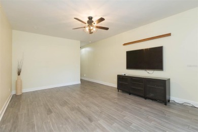 Under contract-accepting backup offers. Escape the hustle and on Heritage Isles Golf and Country Club in Florida - for sale on GolfHomes.com, golf home, golf lot