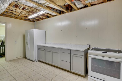 Experience lakefront living at its finest in this beautifully on Tara Golf Club At Savannah Lakes in South Carolina - for sale on GolfHomes.com, golf home, golf lot