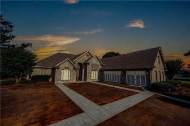 Discover luxury living at its finest in this custom-built home on Red Eagle Golf Course in Alabama - for sale on GolfHomes.com, golf home, golf lot