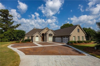 Discover luxury living at its finest in this custom-built home on Red Eagle Golf Course in Alabama - for sale on GolfHomes.com, golf home, golf lot