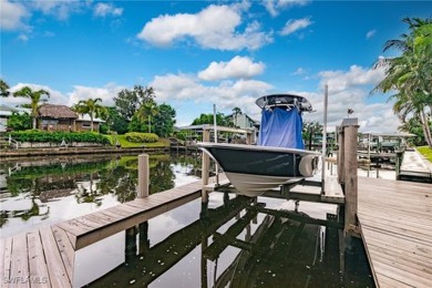 Welcome to waterfront living at its finest! Strategically on Whiskey Creek Country Club in Florida - for sale on GolfHomes.com, golf home, golf lot