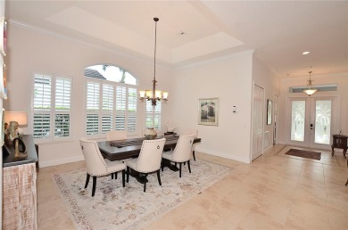 Stunning 4BR, 3.5BA pool home on a lakefront lot overlooking the on The Club At Pointe West in Florida - for sale on GolfHomes.com, golf home, golf lot