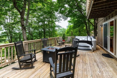 Tucked into the gated Wolf Laurel community at 4,300 feet on Wolf Laurel Country Club in North Carolina - for sale on GolfHomes.com, golf home, golf lot