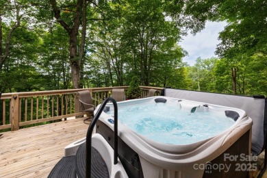 Tucked into the gated Wolf Laurel community at 4,300 feet on Wolf Laurel Country Club in North Carolina - for sale on GolfHomes.com, golf home, golf lot